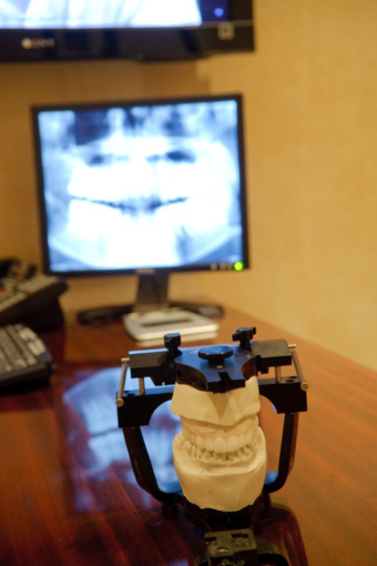 Preparation For Fixing Teeth in Wesley Chapel FL Including Articulator, Plaster Model and X-ray
