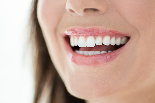 Wesley Chapel Lady with Bright Smile After Getting Reconstructive Dentistry Services
